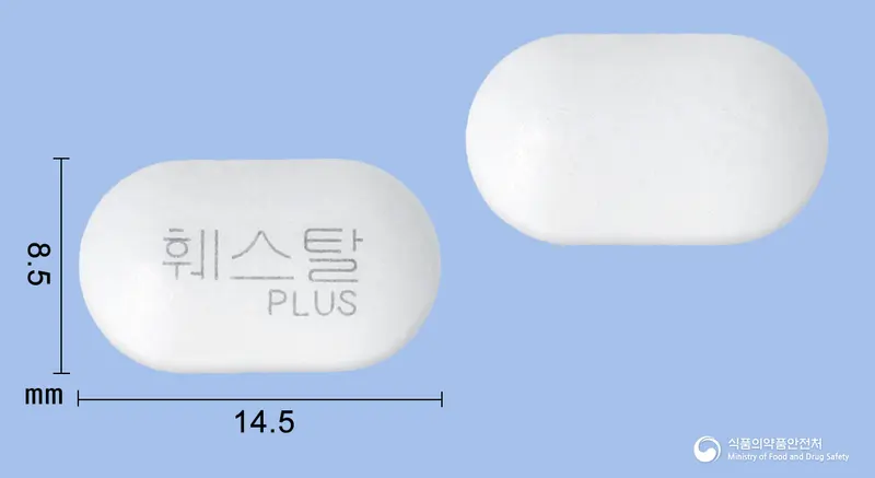 훼스탈플러스정 앞뒤 사진 (흰색 장방형, 각인 훼스탈PLUS)