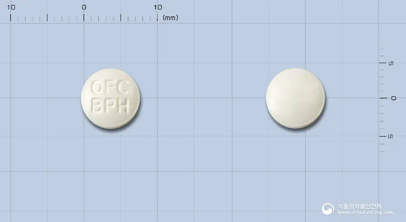 오푸신정(오플록사신) 앞뒤 사진 (흰색 원형, 각인 OFCBPH)