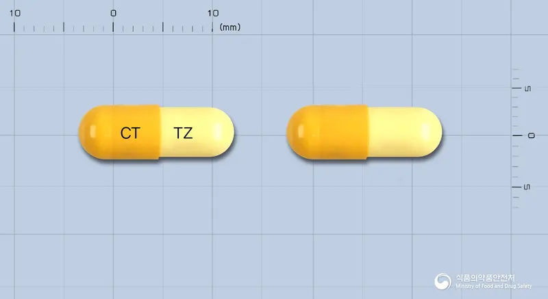 틴자캡슐150mg(니자티딘) 앞뒤 사진 (노란색 캡슐, 각인 CT TZ)