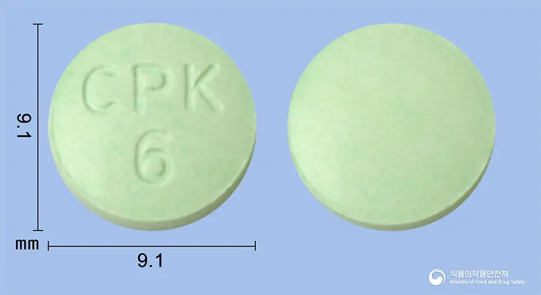 씨엠지시메티딘정200mg 앞뒤 사진 (초록색 원형, 각인 CPK6)
