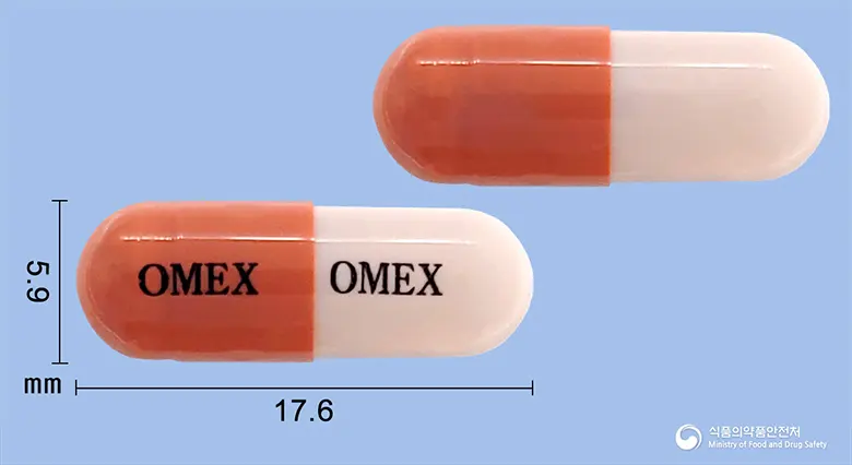 오멕스캡슐(오메프라졸) 앞뒤 사진 (빨간색 캡슐, 각인 OMEX OMEX)