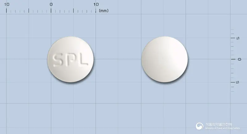 폴리티딘정 앞뒤 사진 (흰색 원형, 각인 SPL)
