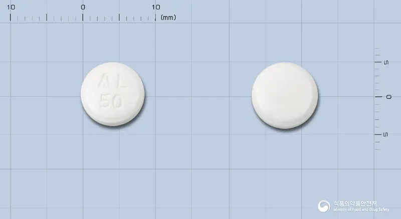 알리코아테놀롤정50밀리그램(수출명:아테닐정) 앞뒤 사진 (흰색 원형, 각인 AL 50)