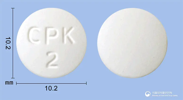 라티딘정 앞뒤 사진 (흰색 원형, 각인 CPK2)