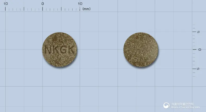 징크린정(은행엽엑스)(수출명:NEXTGINKTablet) 앞뒤 사진 (갈색 원형, 각인 NKGK)