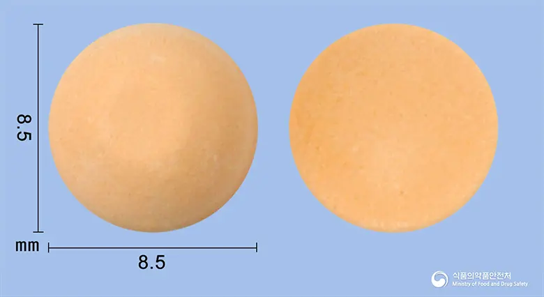 나제아오디정0.1mg(라모세트론염산염) 앞뒤 사진 (주황색 원형)