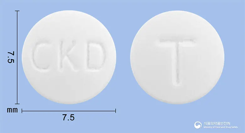 안티모딕정(티로프라미드염산염) 앞뒤 사진 (흰색 원형, 각인 CKD / T)