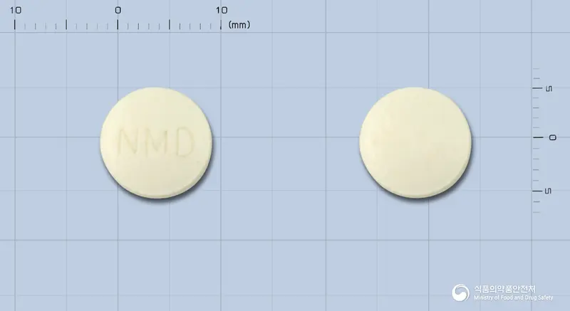 보령니모디핀정30mg 앞뒤 사진 (흰색 원형, 각인 NMD)