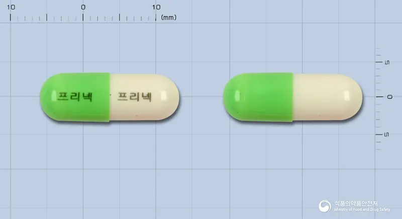 프리넥캡슐 앞뒤 사진 (연두색 캡슐, 각인 프리넥 프리넥)