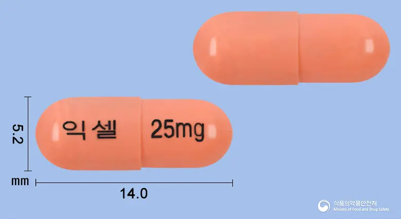 익셀캡슐25밀리그램(밀나시프란염산염) 앞뒤 사진 (주황색 캡슐, 각인 익셀 25mg)