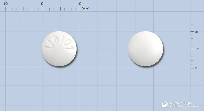클리신정(클로닉신리시네이트)(수출명:CLICIN Tab) 앞뒤 사진 (흰색 원형, 각인 Wal01)