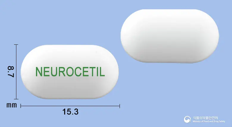 뉴로세틸정(아세틸-L-카르니틴염산염) 앞뒤 사진 (흰색 장방형, 각인 NEUROCETIL)