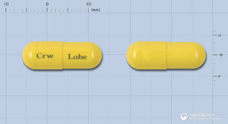 로페베론캡슐 앞뒤 사진 (노란색 캡슐, 각인 Crw Lobe)