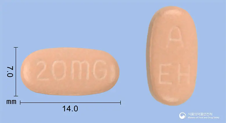 넥시움정20밀리그램(에스오메프라졸마그네슘) 앞뒤 사진 (분홍색 장방형, 각인 AEH / 20mG)