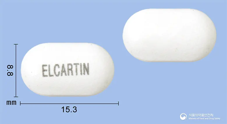 엘카틴정(아세틸엘카르니틴염산염) 앞뒤 사진 (흰색 장방형, 각인 ELCARTIN)