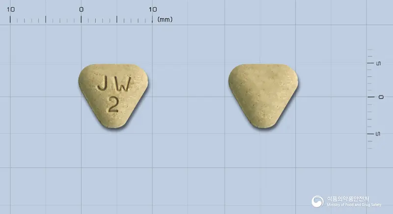 정우사칠탕엑스정 앞뒤 사진 (회색 삼각형, 각인 JW2)