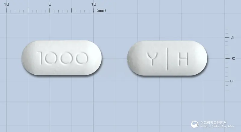 유한비타민씨정1000mg 앞뒤 사진 (흰색 장방형, 각인 1000 / Y H)