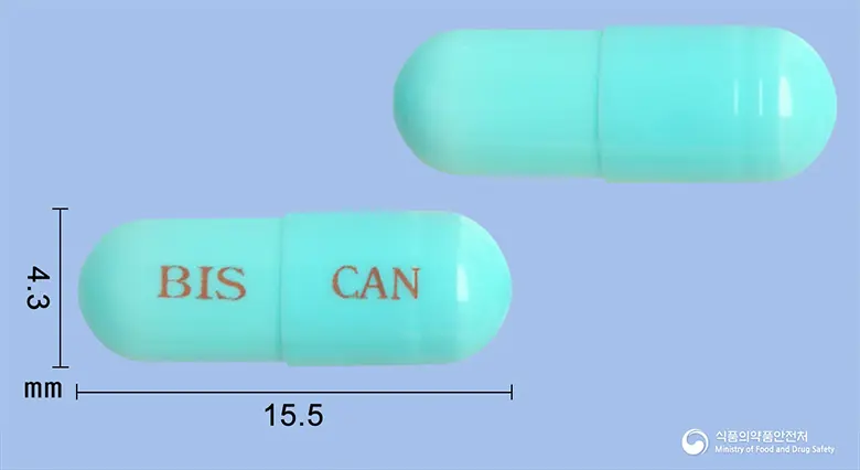 비스칸지캡슐 앞뒤 사진 (파란색 캡슐, 각인 BIS CAN)