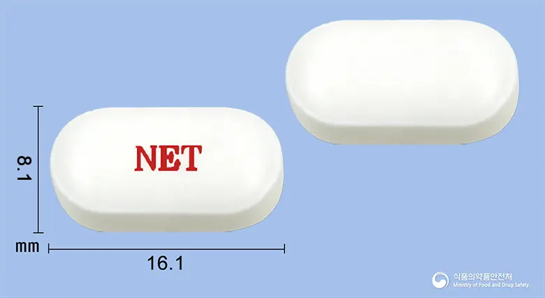 뉴트릭스정(아세틸-L-카르니틴염산염) 앞뒤 사진 (흰색 장방형, 각인 NET)