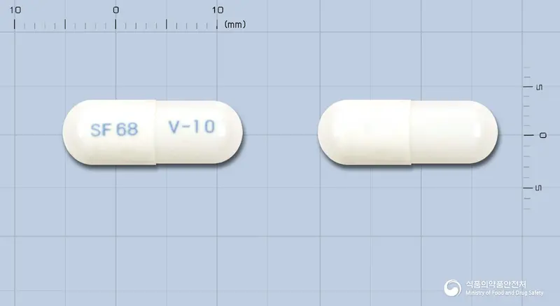 벤투룩스아시도캅셀(스트렙토코카스페시움스트레인세르넬레68균)(수출명:INTESTERACIDOCAPSULES) 앞뒤 사진 (흰색 캡슐, 각인 SF 68 V-10)