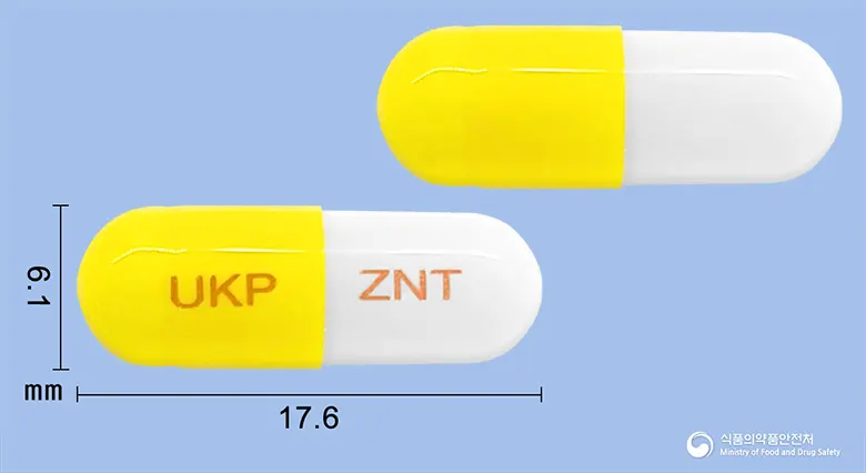 지나틴캡슐(니자티딘) 앞뒤 사진 (노란색 캡슐, 각인 UKP ZNT)