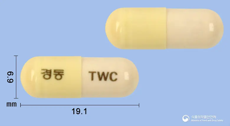 투윈콜캡슐(수출용) 앞뒤 사진 (노란색 캡슐, 각인 경동 TWC)