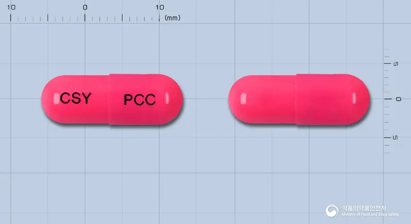 파크러캡슐(세파클러수화물) 앞뒤 사진 (분홍색 캡슐, 각인 CSY PCC)