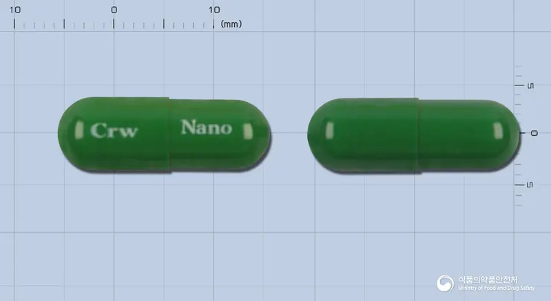 나노베시캅셀 앞뒤 사진 (초록색 캡슐, 각인 Crw Nano)