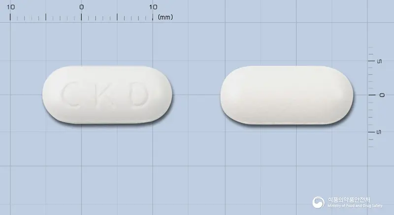 크목실린정625밀리그램[수출명: 클루목스정625mg(CLUMOX TABLET 625mg),코멘틴정625mg(KOMENTIN TABLET 625mg)] 앞뒤 사진 (흰색 장방형, 각인 CKD)