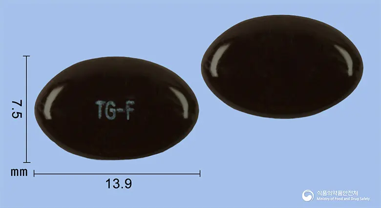 타겐에프연질캡슐(빌베리건조엑스) 앞뒤 사진 (갈색 캡슐, 각인 TG-F)