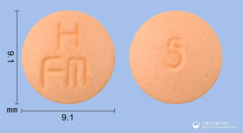 하이드로핀정(펠로디핀) 앞뒤 사진 (분홍색 원형, 각인 HFm / 5)