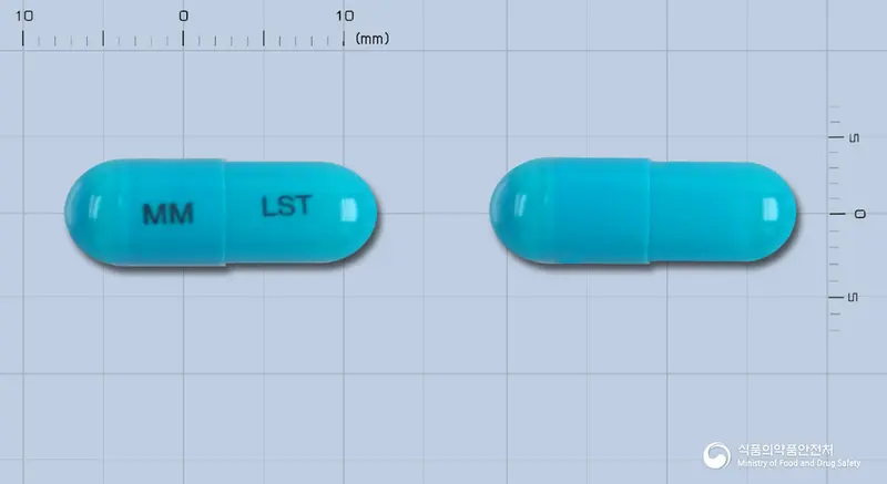 레스톨캡슐 앞뒤 사진 (파란색 캡슐, 각인 MM LST)