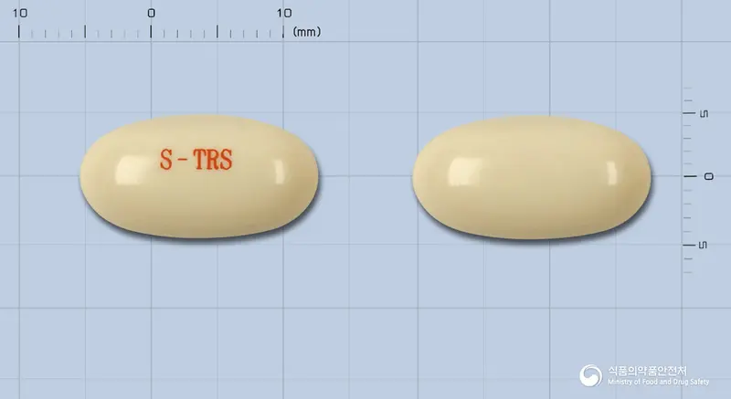 토레스에프연질캅셀(수출용) 앞뒤 사진 (흰색 캡슐, 각인 S-TRS)