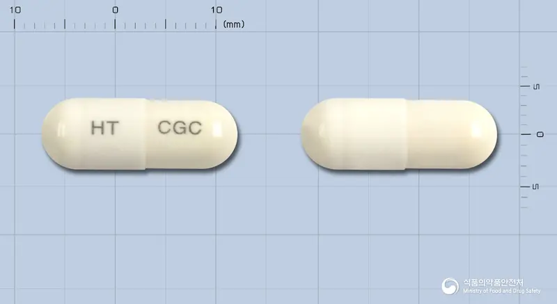 콜가캅셀 앞뒤 사진 (흰색 캡슐, 각인 HT CGC)