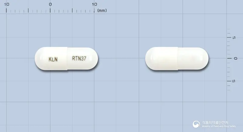 록사틴서방형캡슐37.5mg(록사티딘아세테이트염산염) 앞뒤 사진 (흰색 캡슐, 각인 KLN RTN37)