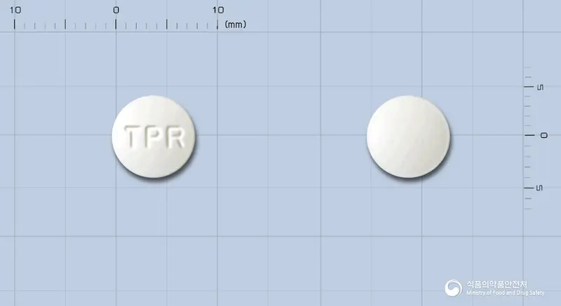 티프론정(티로프라미드염산염) 앞뒤 사진 (흰색 원형, 각인 TPR)