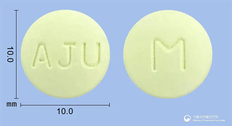 메티콘정(시메티딘) 앞뒤 사진 (연두색 원형, 각인 AJU / M)