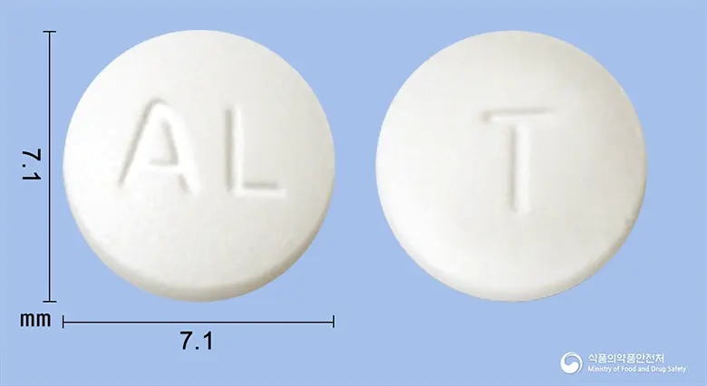 티미드정(티로프라미드염산염) 앞뒤 사진 (흰색 원형, 각인 AL / T)