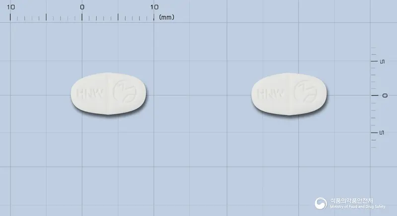 트리테이스플러스정5/25mg 앞뒤 사진 (흰색 타원형, 각인 HNW / HNW)