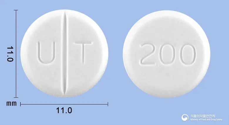 우소산정200mg(우르소데옥시콜산)(수출용) 앞뒤 사진 (흰색 원형, 각인 U T / 200)