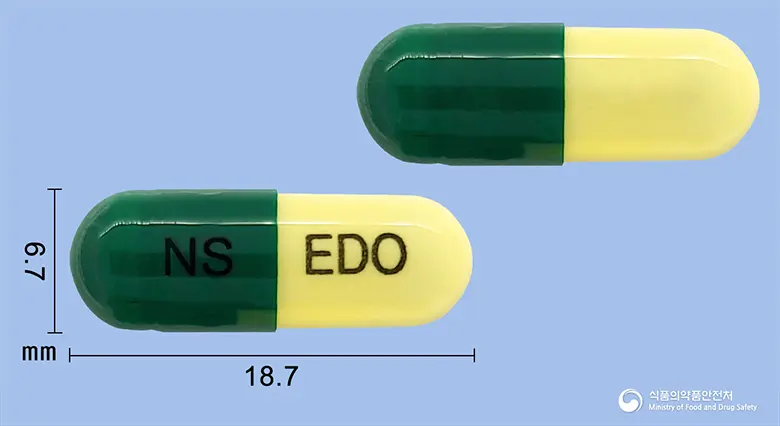 에도스텐캡슐(에르도스테인) 앞뒤 사진 (초록색 캡슐, 각인 NS EDO)