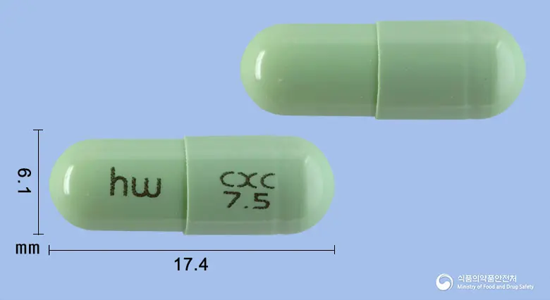 콕시캄캡슐(멜록시캄) 앞뒤 사진 (초록색 캡슐, 각인 hw CXC 7.5)
