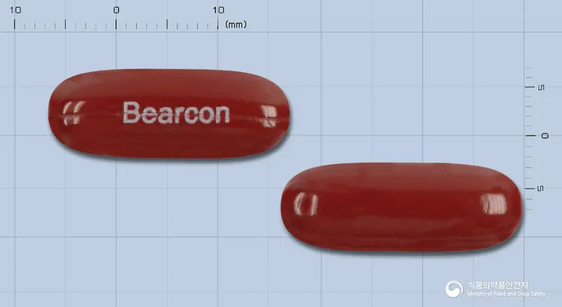 베아콘300연질캡슐 앞뒤 사진 (갈색 캡슐, 각인 Bearcon)