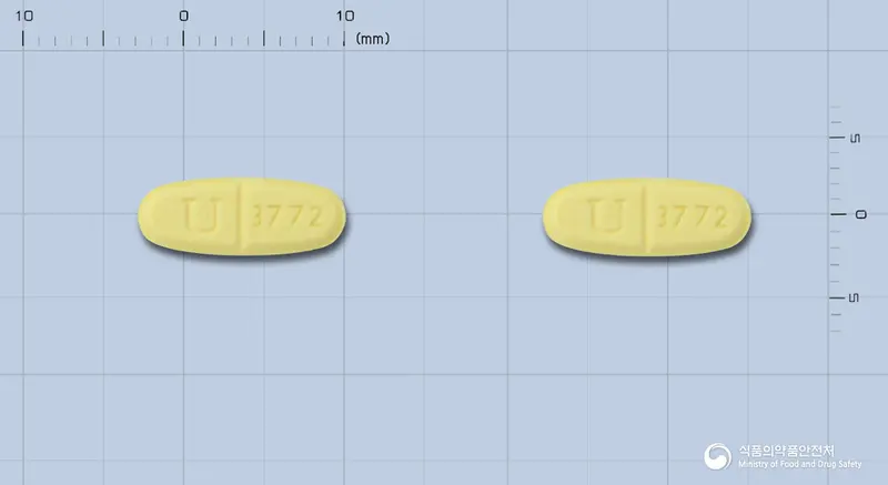 오젠정0.625mg 앞뒤 사진 (노란색 장방형, 각인 U 3772 / U 3772)