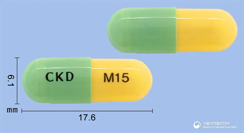 멜락스캡슐15밀리그램(멜록시캄) 앞뒤 사진 (연두색 캡슐, 각인 CKD M15)