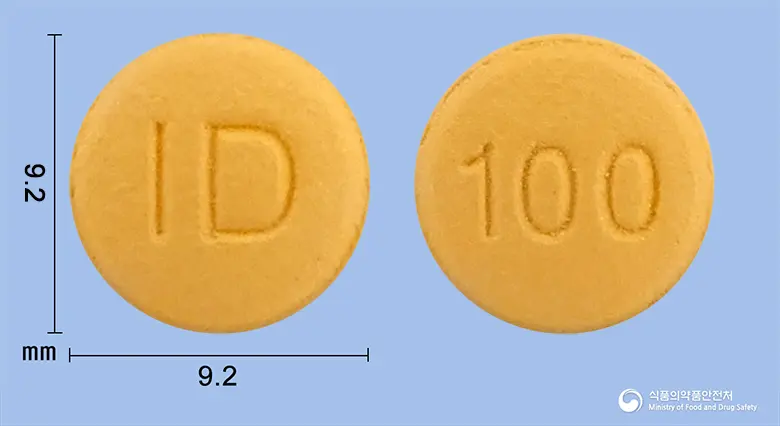 토파메드정100밀리그램(토피라메이트) 앞뒤 사진 (노란색 원형, 각인 ID / 100)