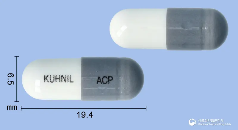 부로필캡슐(아세브로필린) 앞뒤 사진 (회색 캡슐, 각인 KUHNIL ACP)