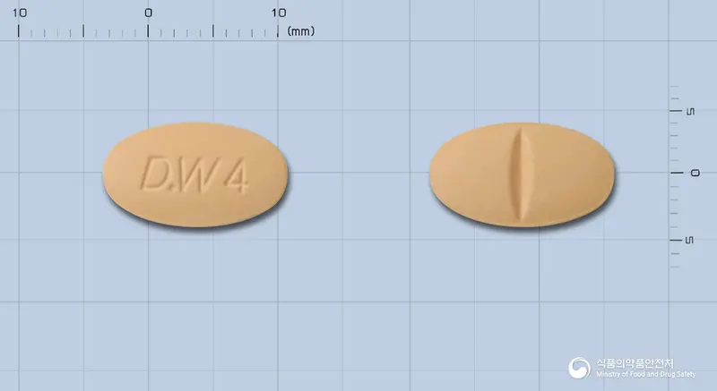 대웅심바스타틴정40밀리그람(수출명:Starzoko40mg) 앞뒤 사진 (주황색 타원형, 각인 D.W4)