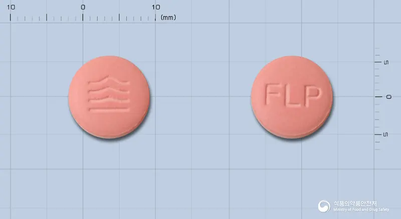 바이넥스펠로디핀정 앞뒤 사진 (분홍색 원형, 각인 FLP)