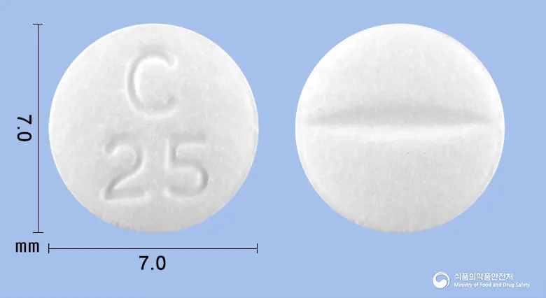 카디론정(카르베딜롤) 앞뒤 사진 (흰색 원형, 각인 C25)